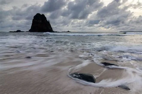 Papuma beach stock image. Image of wave, beach, sunrise - 203262809