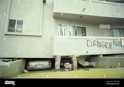 Los Angeles, CA, USA, January 1994. Apartment building with cars ...