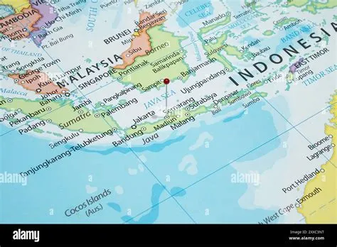 Close up to a Semarang city with a red pin needle into Indonesia ...