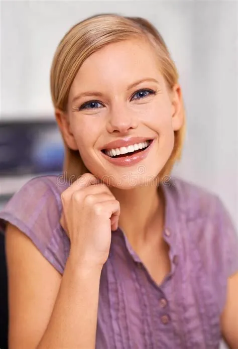 Keeping the Nerves at Bay. Portrait of an Attractive Smiling Young ...