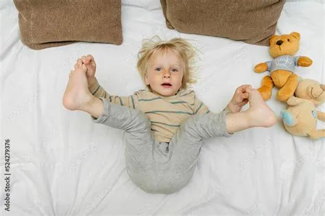 Cute little blond caucasian child kid toddler boy playing,having fun ...