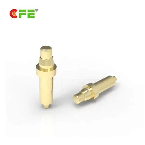 Through hole spring loaded electrical contact pins