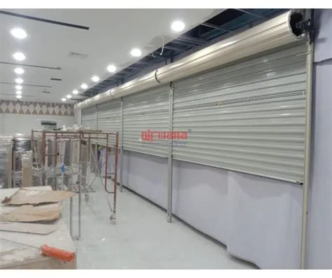 Pemasangan Rolling Door One Sheet 30cm Perforated di RIA BUSANA Lippo ...