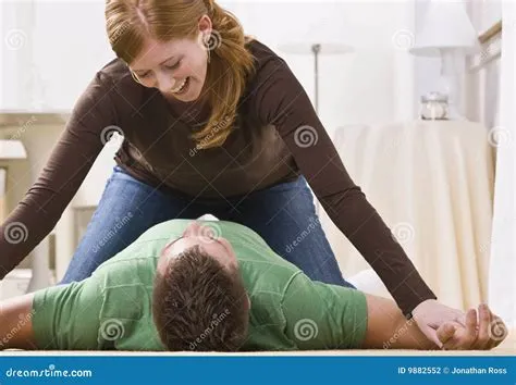 Playful Redhead Pinning Man Stock Photo - Image of caucasian, house ...