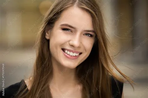 Young beautiful smiling girl. Natural beauty, woman with perfect smile ...
