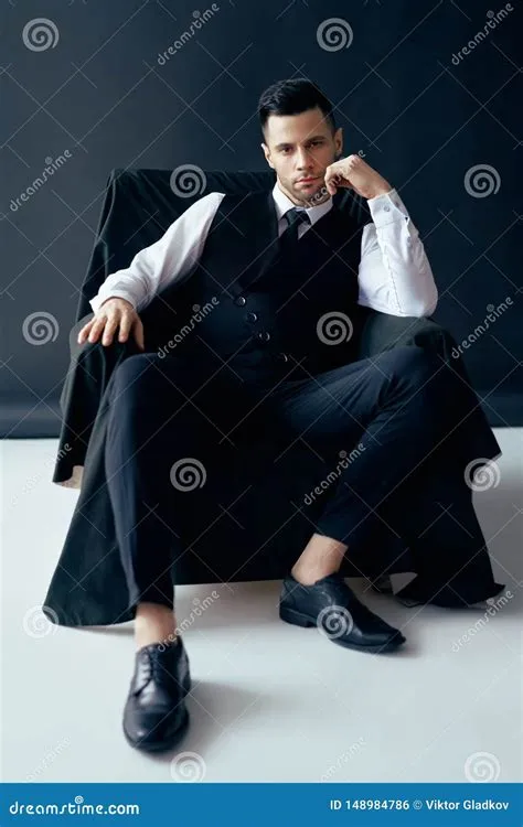 Confident Thoughtful Man in Elegant Suit Posing Sitting in Chair Stock ...