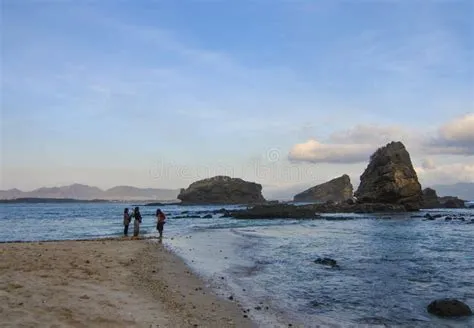 Tourist Enjoy Sunset Moment at Papuma Beach in Jember, Indonesia ...