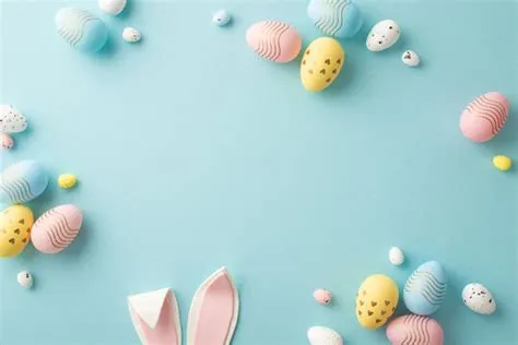 A clipart image featuring cute Easter bunnies and colorful eggs on a ...