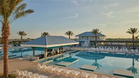 A Pool With Chairs Around It