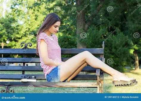 Sad Thoughtful Young Girl Sitting Alone on a Bench Outdoors. Pretty ...