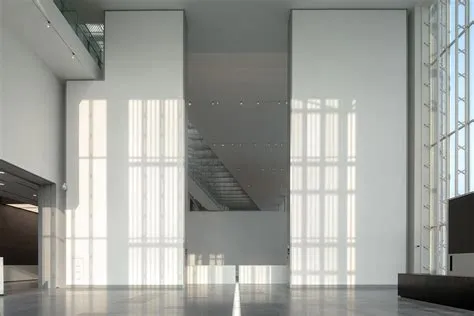 anhui art museum glows behind ethereal facade in hefei, china