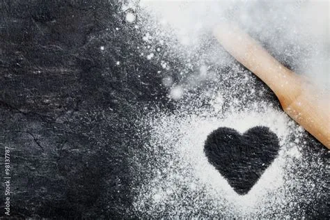 Baking desk with flour and rolling pin, top view, space for text Stock ...