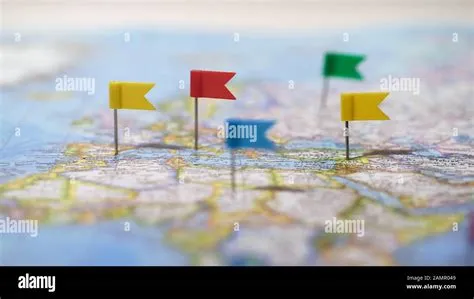 Pins mark cities and towns in countries on world map, mobile network ...