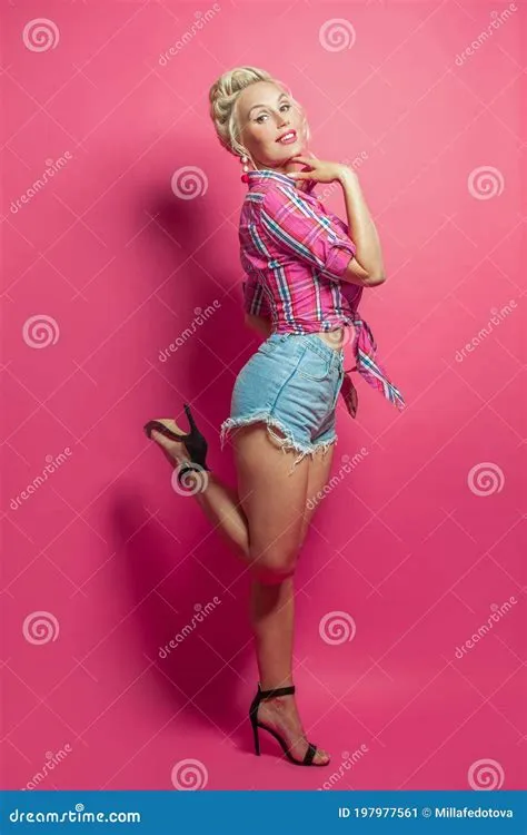 Pinup Woman in High Heels Standing on Vibrant Pink Background ...