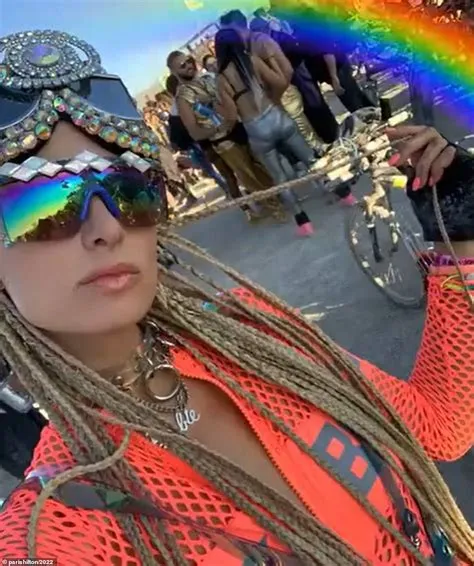 Paris Hilton shows off her hot pink outfit in preparation for the ...