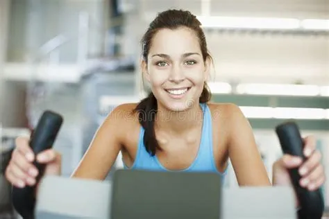 Girl, Portrait and Bike in Gym for Fitness, Exercise and Happy for ...