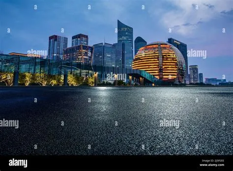 Asphalt road and modern city skyline with buildings in Hangzhou at ...