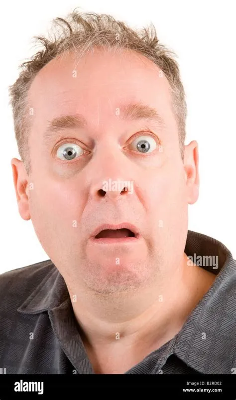 The face of a man being afraid of something Stock Photo - Alamy