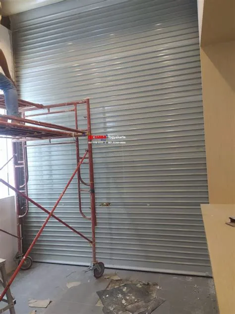 Pemasangan Rolling Door One Sheet Full Perforated di Huawei Lippo Mall ...