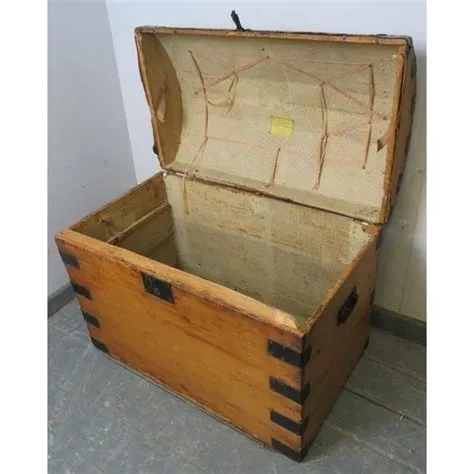 An antique pine dome topped trunk by James Northam of Exeter, having ...