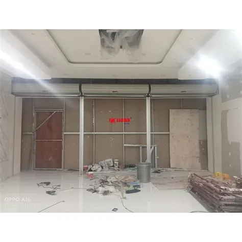Pemasangan Rolling Door One Sheet Full Perforated di Tenant Toko Mas ...