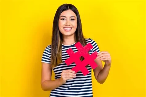 Photo of Cheerful Chinese Young Girl Paper Hashtag Pin Trend Symbol ...