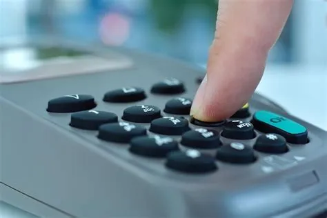 Premium Photo | Hand dials pin code on pos terminal