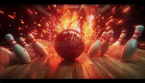 A Bowling Ball Rolling Down the Alley and Hitting Many Pins, Creating ...