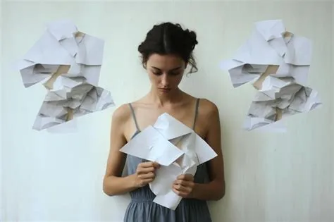 Premium Photo | A woman holds up a stack of paper with the words paper ...