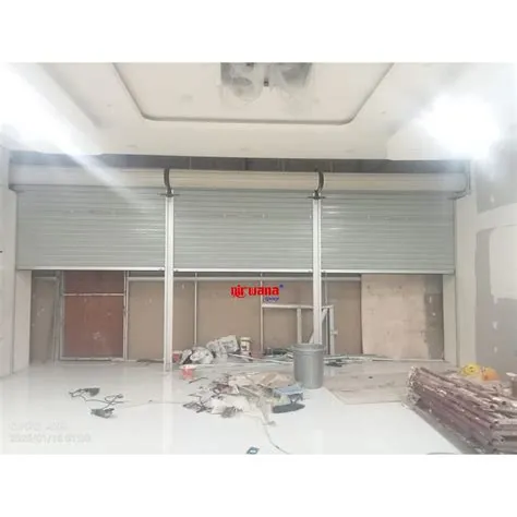 Pemasangan Rolling Door One Sheet Full Perforated di Tenant Toko Mas ...
