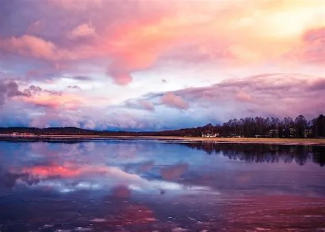 Premium Photo | A cloudy sky with a pink sunset and clouds in the ...