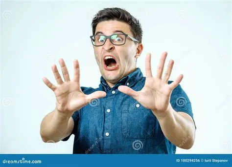 Man with Scared Expression on His Face Making Frightened Gesture Stock ...