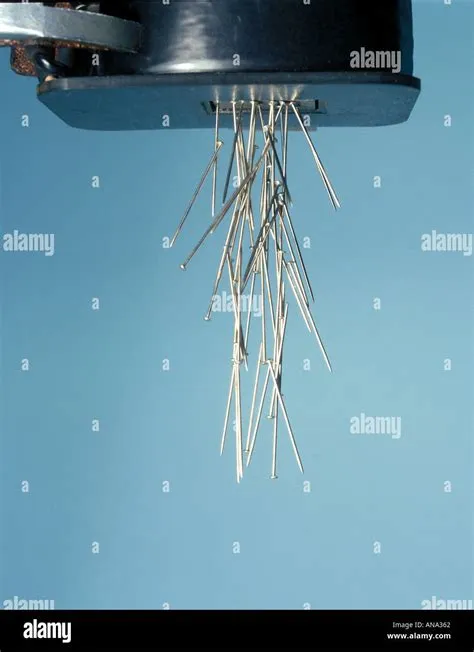 steel pins attracted to an electromagnet Stock Photo - Alamy