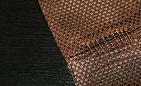 Premium Photo | Safety pins on fabric background