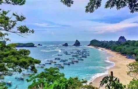 Info Wisata Pantai Papuma Jember: Daya Tarik, Aktivitas, Harga Tiket ...